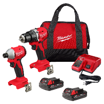 Milwaukee tool kit with drill, impact driver, and accessories on a white background